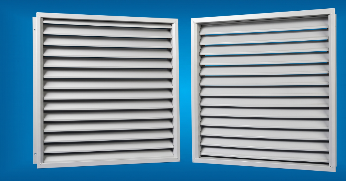 Industrial metal louvers installed on building wall for ventilation and airflow control in Vapi